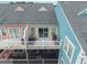 A private balcony with outdoor seating offers a relaxing spot with an extra storage area at 81 Sandbar Ln # 23, Folly Beach, SC 29439