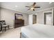 Comfortable bedroom with carpet, ceiling fan, dresser, and a large bed with night stand at 81 Sandbar Ln # 23, Folly Beach, SC 29439