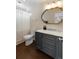 This bathroom showcases a marble vanity, gray cabinetry, and modern fixtures for a stylish and functional space at 815 Harbor Pl Dr, Charleston, SC 29412
