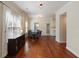 Bright dining room with hardwood floors and ample natural light from large windows at 815 Harbor Pl Dr, Charleston, SC 29412