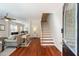 Inviting entryway with hardwood floors, staircase, and open view to the living room at 815 Harbor Pl Dr, Charleston, SC 29412