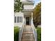 Inviting front entrance featuring a decorative glass door and a well-maintained wooden staircase at 815 Harbor Pl Dr, Charleston, SC 29412