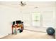 Bright bedroom with a ceiling fan, three large windows, and plenty of natural light perfect for a home office or study at 9122 Maple Grove Dr, Summerville, SC 29485