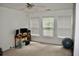 Empty bedroom features carpeted floors, blinds and three windows providing ample light at 9122 Maple Grove Dr, Summerville, SC 29485