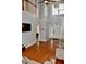Inviting home foyer with gleaming hardwood floors, a high ceiling and access to the second story at 9122 Maple Grove Dr, Summerville, SC 29485