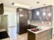Contemporary kitchen with stainless appliances, granite countertops, and modern lighting at 101 Limerick Cir, Summerville, SC 29483
