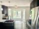 Beautiful kitchen with stainless steel appliances and granite counters overlooking backyard at 101 Limerick Cir, Summerville, SC 29483