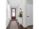 Elegant entryway with a decorative door, console table, and beautiful mirror at 101 Patterson Ave, Goose Creek, SC 29445