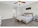 Bright main bedroom features carpet, a ceiling fan and a glimpse into an adjoining room at 101 Patterson Ave, Goose Creek, SC 29445