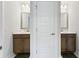 Neutral bathroom featuring dual vanities, white countertops, and modern finishes at 1017 Saltwater Cir, Johns Island, SC 29455