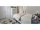 Comfortable bedroom with a decorative cabinet, and open doorway offering depth in the space at 1017 Saltwater Cir, Johns Island, SC 29455