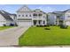 Beautiful two-story home with a well-kept lawn and inviting curb appeal at 1017 Saltwater Cir, Johns Island, SC 29455