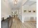 Elegant hallway with hardwood floors and decorative wall accents at 1017 Saltwater Cir, Johns Island, SC 29455