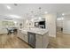 Bright kitchen with a large island, stainless steel appliances, and open floor plan at 1017 Saltwater Cir, Johns Island, SC 29455