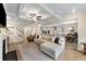 Open floor plan of a living room flowing into the kitchen featuring wood floors and recessed lighting at 1017 Saltwater Cir, Johns Island, SC 29455