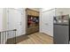 Well-organized mudroom with built-in storage, bench, and easy access to the outdoors at 1017 Saltwater Cir, Johns Island, SC 29455