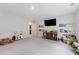 Bright playroom with a large TV, shelving for books, and plenty of space to play at 1017 Saltwater Cir, Johns Island, SC 29455