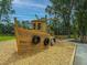 Wooden boat structure found in the community playground with picnic table and pathway in the background at 1017 Saltwater Cir, Johns Island, SC 29455