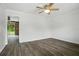 Bright bedroom features new floors and a ceiling fan at 102 Berkshire Ct, Goose Creek, SC 29445