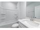 Bright bathroom showcasing a tub and shower combination, plus a single sink at 122 Royal Cainhoy Way, Huger, SC 29450