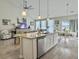 Open-concept kitchen featuring a central island, stainless steel appliances, and ample countertop space at 123 Oyama Rd, Summerville, SC 29486