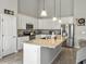 Well-equipped kitchen with stainless steel appliances, granite countertops, and a spacious island at 123 Oyama Rd, Summerville, SC 29486