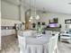 Bright, open-concept living room features a modern kitchen and dining area, perfect for entertaining at 123 Oyama Rd, Summerville, SC 29486