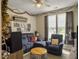 Cozy living room with plush blue seating, natural light, and decorative accents at 123 Oyama Rd, Summerville, SC 29486