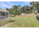 Large fenced backyard features a storage shed and plenty of space for outdoor activities and relaxation at 127 Rawlins Dr, Summerville, SC 29485