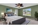 This primary bedroom offers a ceiling fan and an abundance of natural light at 127 Rawlins Dr, Summerville, SC 29485