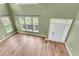 Bright foyer featuring soaring ceilings, hardwood floors, and lots of natural light from the large windows at 127 Rawlins Dr, Summerville, SC 29485