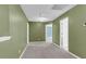 Upstairs hallway featuring carpet floors, neutral walls, white baseboards, doors, and trim at 127 Rawlins Dr, Summerville, SC 29485