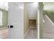 Interior hallway view showcasing access to stairs and additional storage at 127 Rawlins Dr, Summerville, SC 29485