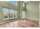 A spacious living area with large windows, hardwood floors, and lots of natural light at 127 Rawlins Dr, Summerville, SC 29485