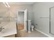 Bathroom with a single oak vanity, toilet, and glass shower at 1321 Wild Olive Dr, Mount Pleasant, SC 29464