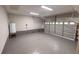 Spacious garage featuring a sealed floor and an insulated garage door at 1321 Wild Olive Dr, Mount Pleasant, SC 29464