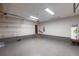 View of a garage with sealed floor and shelving on the walls at 1321 Wild Olive Dr, Mount Pleasant, SC 29464