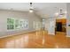 Open-concept living area with a kitchen and large windows create a bright, inviting space at 1321 Wild Olive Dr, Mount Pleasant, SC 29464