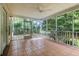 Spacious screened-in porch offers outdoor enjoyment and views of a lush, private backyard at 1321 Wild Olive Dr, Mount Pleasant, SC 29464