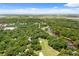 Scenic aerial view of a lush, green neighborhood featuring a golf course and serene water features at 1326 Sea Elder Dr, Kiawah Island, SC 29455