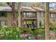 Inviting multi-level townhome featuring cozy balconies and natural surroundings with ample shrubbery at 1326 Sea Elder Dr, Kiawah Island, SC 29455