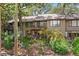 Charming multi-story townhome nestled amidst verdant foliage and mature palm trees at 1326 Sea Elder Dr, Kiawah Island, SC 29455