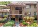 Inviting multi-level townhome featuring cozy balconies and natural surroundings with ample shrubbery at 1326 Sea Elder Dr, Kiawah Island, SC 29455