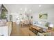 Open concept living area with updated kitchen and hardwood floors provides ample space and light at 1326 Sea Elder Dr, Kiawah Island, SC 29455