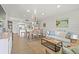 Bright, open living space featuring a dining area, modern kitchen, and cozy seating, perfect for entertaining at 1326 Sea Elder Dr, Kiawah Island, SC 29455