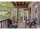 Screened in porch with wooded view provides a private place to relax at 1326 Sea Elder Dr, Kiawah Island, SC 29455