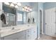 Bright bathroom with double sinks, ample lighting, and a clean, modern design for everyday comfort at 1431 Whispering Oak Trl, Mount Pleasant, SC 29466