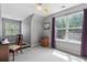 Sunlit bedroom with neutral paint, plush carpet, and bright windows at 1431 Whispering Oak Trl, Mount Pleasant, SC 29466