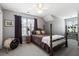 Bedroom with neutral paint, plush carpet, and bright windows at 1431 Whispering Oak Trl, Mount Pleasant, SC 29466