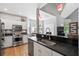 Well-equipped kitchen featuring modern appliances, granite countertops, and an open design at 1431 Whispering Oak Trl, Mount Pleasant, SC 29466
